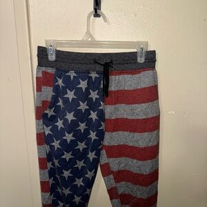 Carbon Red and Blue Sweatpants with Vintage Flag Design